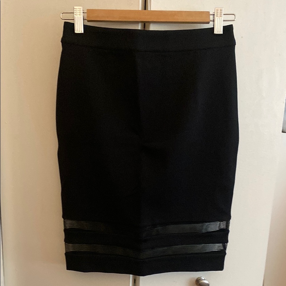 Bebe Black Knee-Length Pencil Skirt . No tags but never worn! Like new